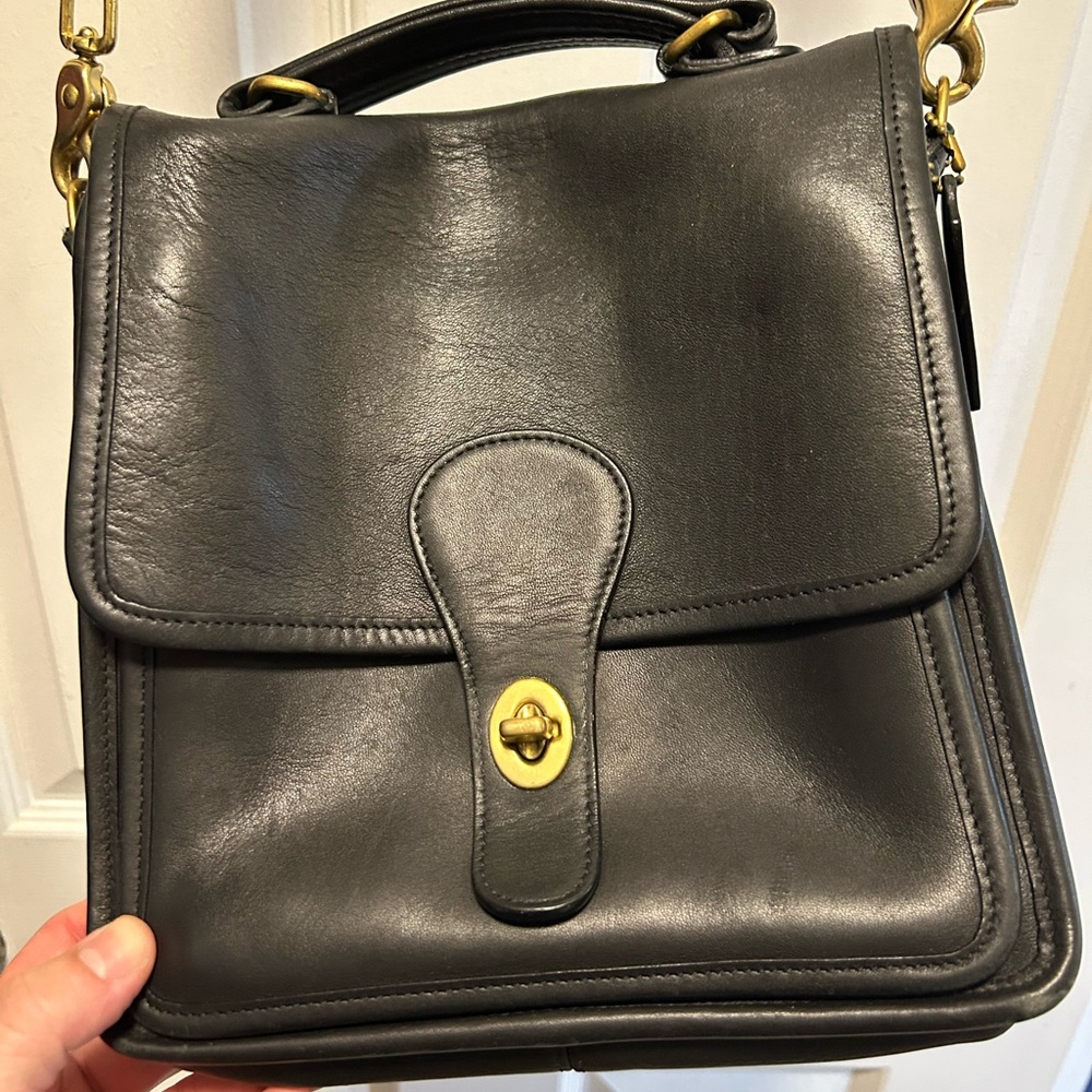 Black Leather Shoulder Bag with Gold Accents